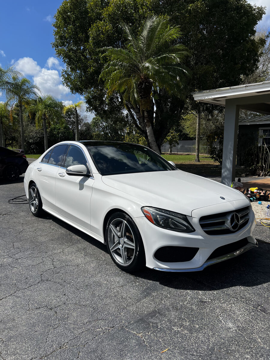 White Mercedes C-Class with deep gloss shine after mobile detailing